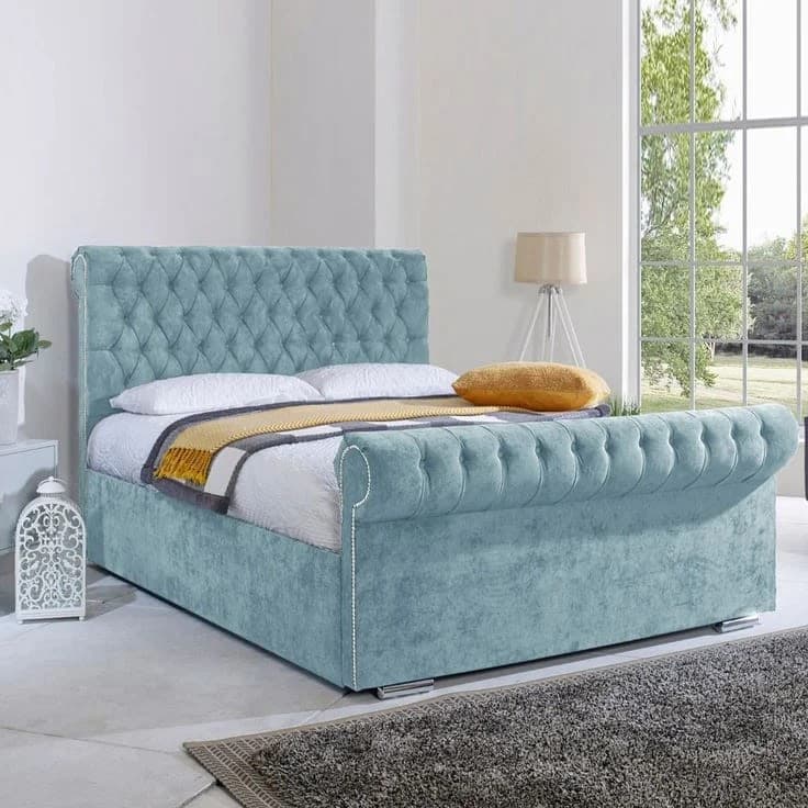 Luxury Upholstered Chesterfield Sleigh Bed Frame | Gas Lift Ottoman & Scroll Top